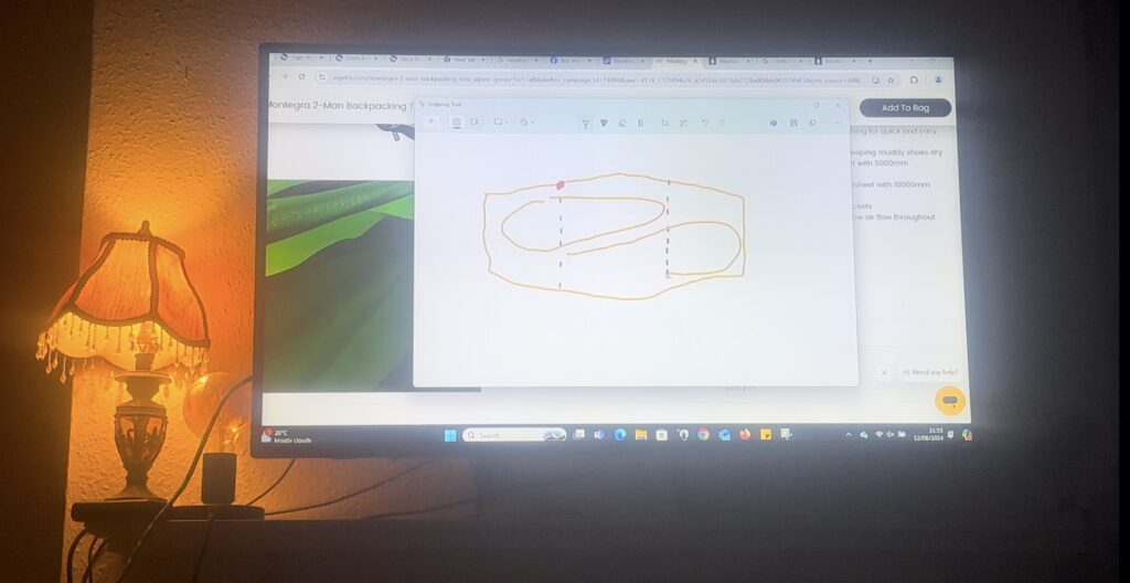 Image of a diagram being drawn on TV screen to illustrate which tent to buy, how we would sleep inside it. 